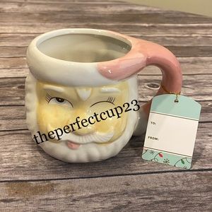 Pink Winking Face Santa Mug